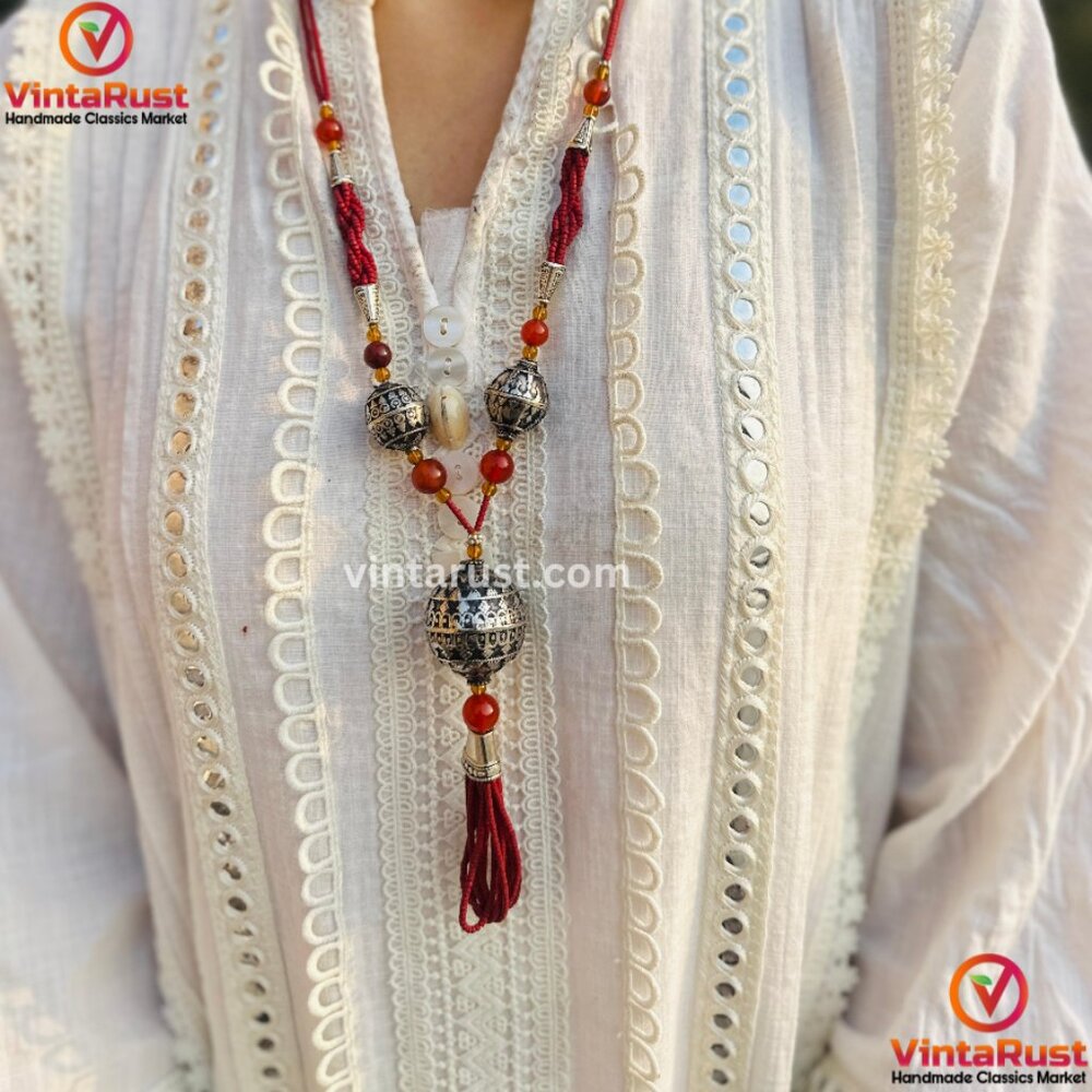 Vintage Style Tassel Necklace: Ornate Metal Beads, Tribal Pendant